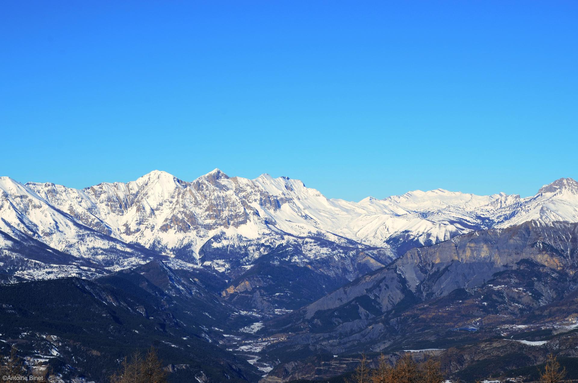 Snow mountain and sun