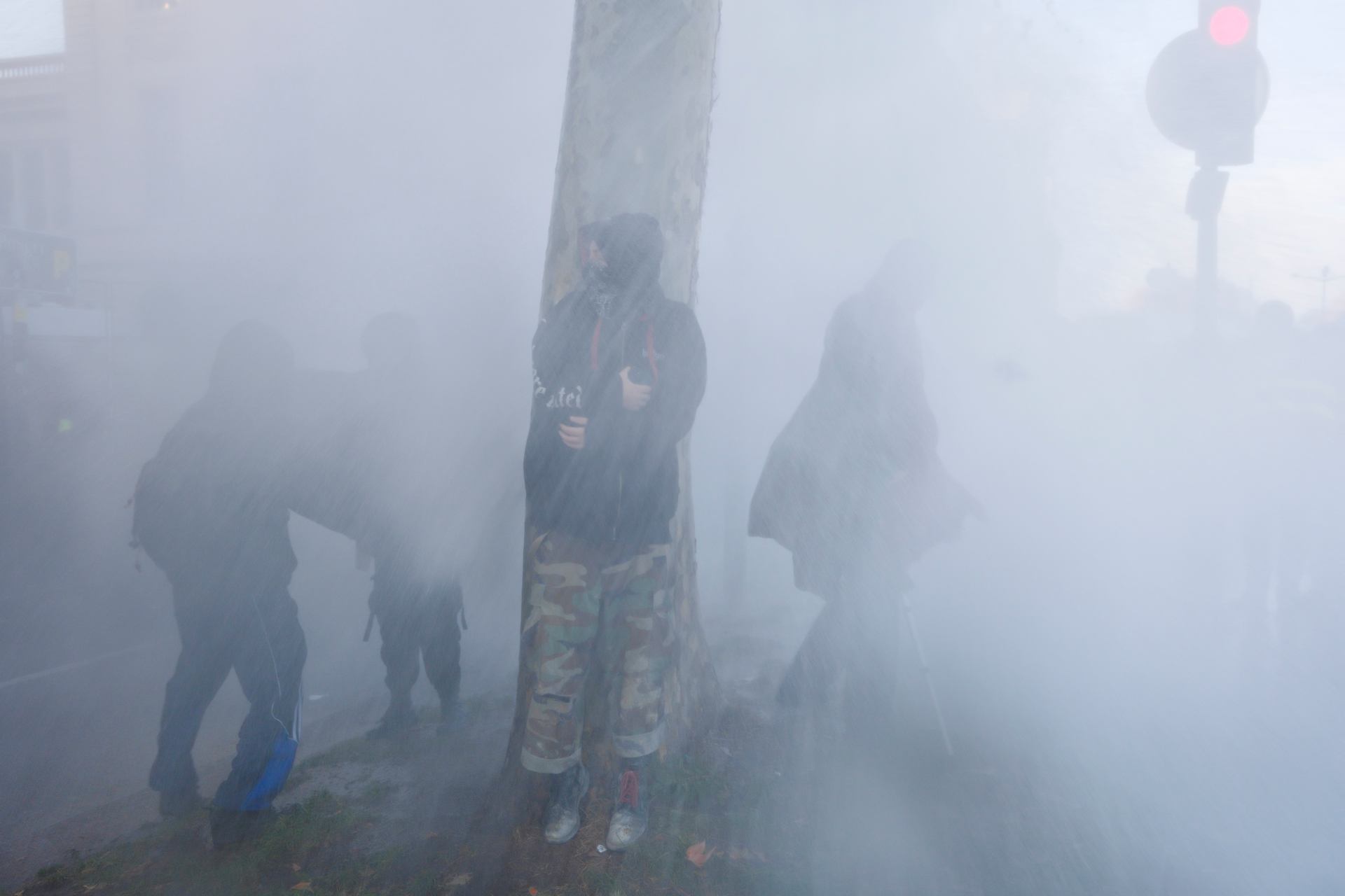 Police water cannon sprays tree !!!